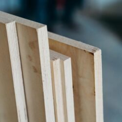 Detailed close-up of plywood panels angled on edge, showing texture and grain.